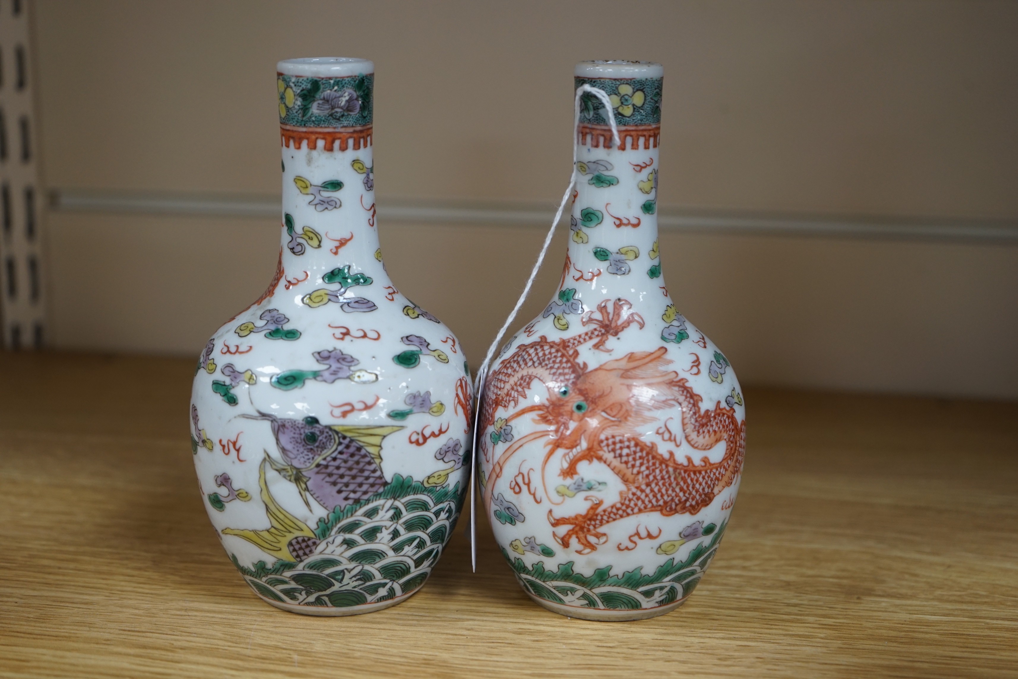 A pair of Chinese enamelled porcelain ‘dragon’ bottle vases, Kangxi marks probably Guangxu period, 15cms high